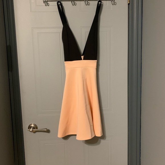 Never worn, low v-neck super cute dress - Picture 2 of 6